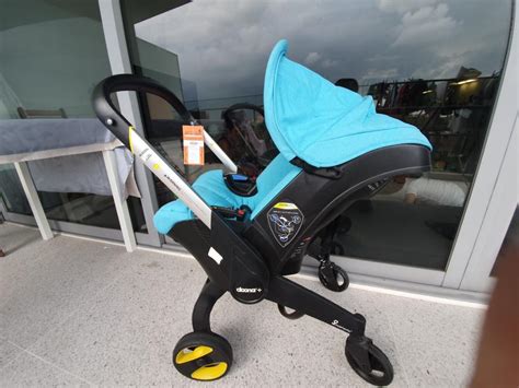 The sleek and stylish design allows you to navigate the streets at ease, without disturbing your sleeping child when hopping in a car, traveling by bus or walking up the stairs. . Used doona car seat
